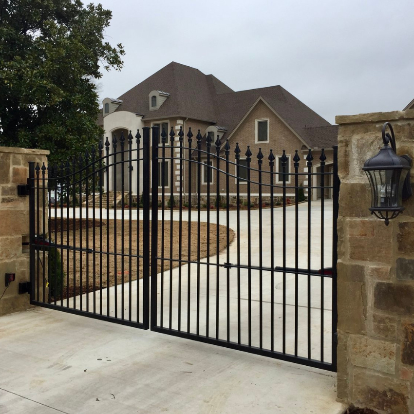 Custom Steel Gate Operator in front of residential drive